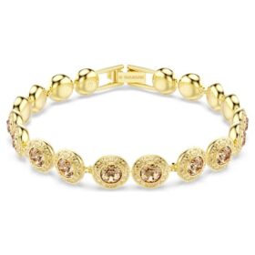 En Angelic-armband, rundslipade karamellfärgade kristaller, guldpläterat