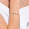 Hyperbola-armband med Infinity-symbol och hjärta, vitt, blandad metallfinish Hyperbola-armband med Infinity-symbol och hjärta, vitt, blandad metallfinish