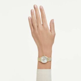 Imber-klocka, tillverkad i Schweiz, metallarmband, guldfärgad, guldfärgad ytbehandling Imber-klocka, tillverkad i Schweiz, metallarmband, guldfärgad, guldfärgad ytbehandling
