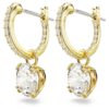 Stilla örhängen med rund slipning, vita, guldpläterade Stilla örhängen med rund slipning, vita, guldpläterade