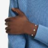 Una Angelic-armband med rundslipade, dubbelsidiga motiv, vitt, rodiumpläterat